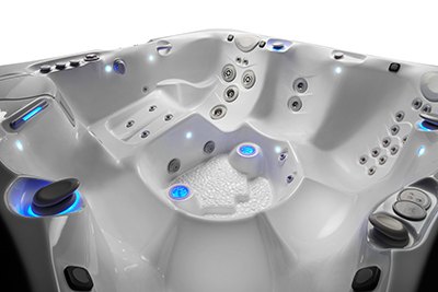 What are some important considerations for hot tub reliability, service, and maintenance?