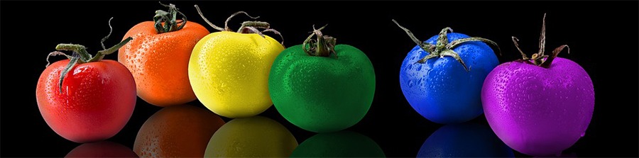 A line of tomatoes in rainbow colors that clearly do not exist in nature reminds us of how color can affect our moods