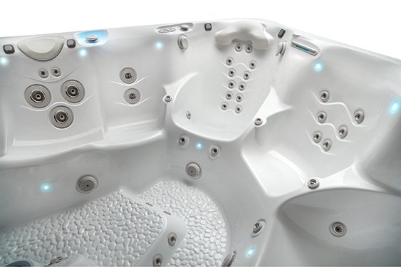 An empty spa shows the depth and shape of the seat to help keep you comfortable seated when bouyant