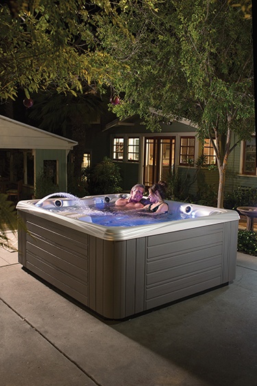 The purple lighting effects of a Caldera hot tub are said to help soothe and smooth conflict