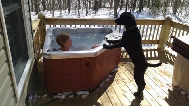 a small hot tub can fit perfectly well on a small deck design